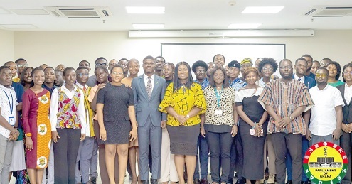 Effia Tenge (arrowed), Director of Public Engagement, Parliament, with some of the students