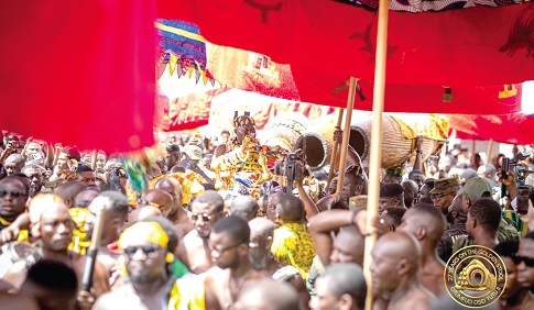 Otumfuo Osei Tutu II, Asantehene, waving to the crowd at Dwabrem in Kumasi