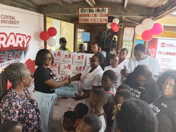 Francisca Yaba Asante (2nd from left), Central University Librarian, handing over the items to  Mary Lomotsu, Deputy Director of Nursing Services, Tema General Hospital