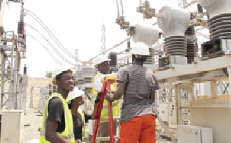 Engineers of ECG busily working on the installation of the new transformer