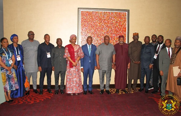 President, John Dramani Mahama (middle) together with the Nigeria and Ghanaian delegations after the meeting
