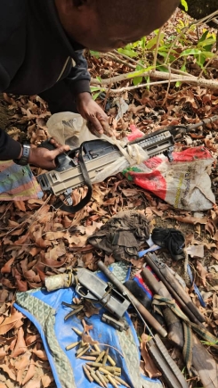 Suspected robbers ambush police during investigation to retrieve buried illegal weapons; Police gun down 2 during shootout