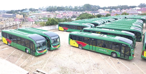 Some Aayalolo buses parked at a terminal in Accra