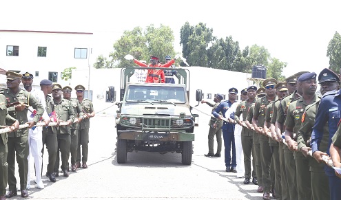 CWO Addo Daniel, retired Forces Sergeant Major, being taken through the pull-out ceremony. Picture: BENEDICT OBUOBI
