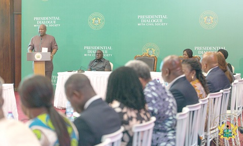 President John Mahama (standing left) addressing the CSOs