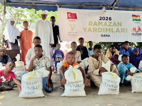Some of the beneficiaries displaying the food items