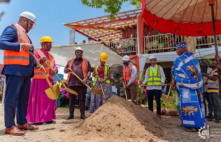 Middle, Constance Swaniker, Founder of Design and Technology Institute with some other dignitaries breaking ground at the site
