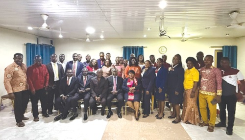 Augustine Addo (seated 3 from left), ICAG President, with members of the KASCITY District Society of the institute