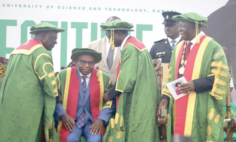 Otumfuo Osei Tutu II ( right), the Asantehene, looking on as Akyamfuo Asafo Boakye Agyemang-Bonsu  (left), Chairman, KNUST Governing Council, and Prof. David Asamoah (2nd from right), the Pro-VC, KNUST, perform the induction ceremony of Prof. Christian Agyare as the 13th Vice-Chancellor of the KNUST. Picture: EMMANUEL BAAH
