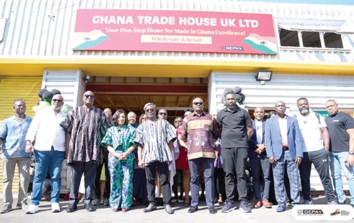 Officials in front of the Trade Hub