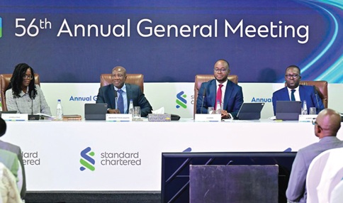 Ebenezer Asante (2nd from left), Board Chair, Stanchart, with some  board members