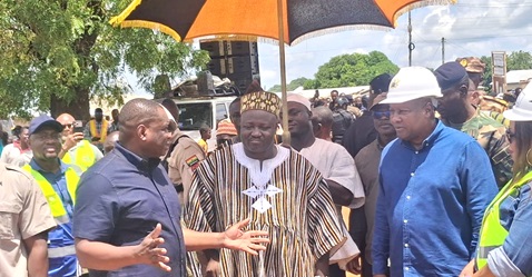 Kwame Governs Agbodza (left), Minister of Roads and Highways, briefing President John Mahama while Pe Ditundini Adiali Ayagitam III (middle), the President of the Upper East Regional House of Chiefs, looks on during the inspection of the Chuchuliga-Sandema road
