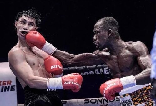Laryea lands a good right hand on Robledo during Saturday's fight in Buenos Aires