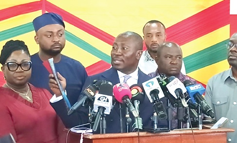 Alexander Afenyo-Markin (3rd from right), Minority Leader,  showing a copy of the IMF report that revealed that the GoldBod lost GH¢22 billion in gold trade in 2025. With him are members of the Caucus,  including Patricia Appiagyei (left), the Deputy Minority Leader