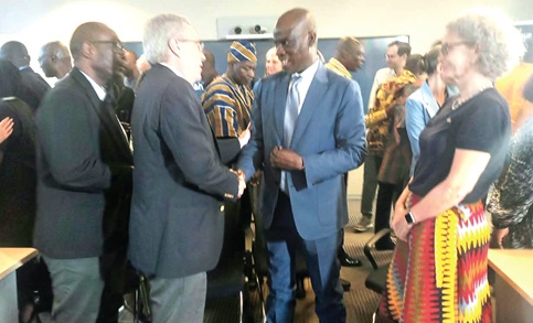 Haruna Iddrisu (2nd from right), Minister of Education, in a handshake with Dr Rob Taliercio, Division Director (World Bank) Ghana, Liberia and Sierra Leone, at the Ghana and Regional Foundational Learning Evidence and Implementation Support Day