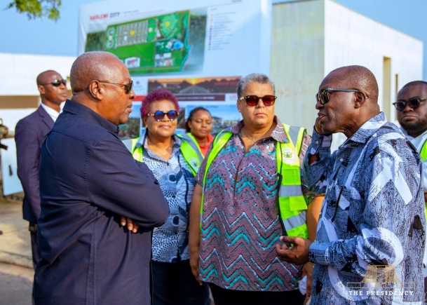  Kojo Aduhene (right), CEO of LMI Holdings, briefing President John Dramani Mahama about the progress of work
