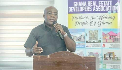 Dr James Condua Orleans-Lindsay (right), President, Ghana Real Estate Developers Association, addressing the meeting. Picture: ERNEST KODZI