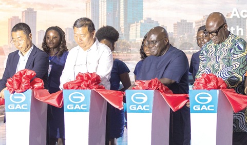 Liquan Yan (left), Vice-President, Ghana Chinese Chamber of Commerce; Yifeng Zhang (2nd from left), Group CEO and Managing Director, FET Auto Company Limited; Dr Julius Debrah (2nd from right), Chief of Staff, and Ebenezer Okletey Terlabi (right), Deputy Minister for the Interior, cutting the ribbon at the launch