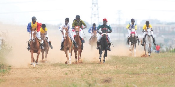 Jockeys competing at the Borteyman Race Course, the home of horseracing in Ghana now at the centre of a contentious land dispute that could threaten the sport’s future