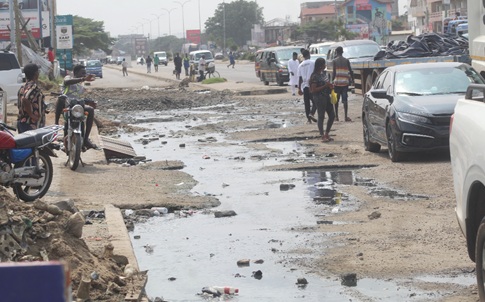 Broken portions of the Dr Busia Highway at Dansoman Junction. Picture: ESHER ADJORKOR ADJEI