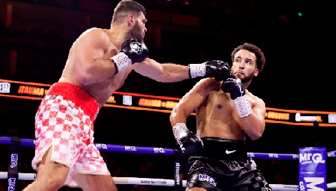 Filip Hrgovic lands a jab to the face of Moses Itauma during the fight