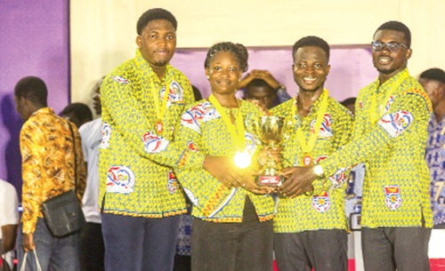 Members of the University of Cape Coast team celebrating with the trophy after winning the Tertiary Business Sense Challenge.  Picture: Caleb Vanderpuye