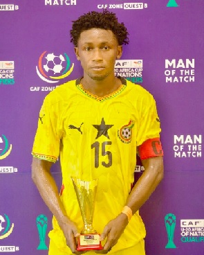 Mohammed Zaidan displaying his award