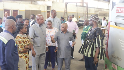 Al-Hassan Ligbi (2nd from right), MD of Intercity STC Coaches Limited, explaining a point to Joseph Bukari Nikpe (3rd from left), Dorcas Affo- Toffey (2nd from left), Deputy Minister of Transport, and other dignitaries during a tour of the facility. Picture: EDNA SALVO KOTEY