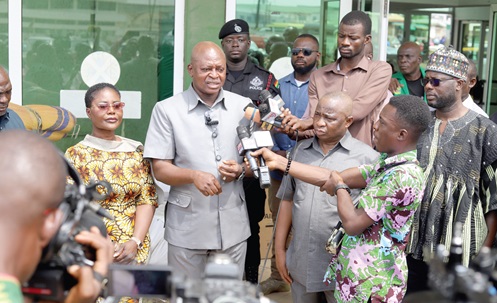 Joseph Bukari Nikpe (3rd from  left), Minister of Transport, speaking to the media. With him are Dorcas Affo Toffey (2nd from left), Deputy Minister of Transport, Al-Hassan Ligbi (3rd from right), MD of Intercity STC Coaches Limited, and other dignitaries. Picture: EDNA SALVO KOTEY