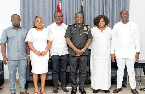 Christian Tetteh Yohuno (3rd from right), IGP, Joseph Osei-Owusu (3rd from left), Chairperson, NPP Presidential Elections Committee, and some members of the committee during a courtesy call on the IGP