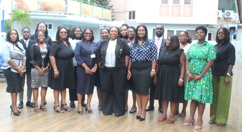 Kate Addo (middle), Coordinating Director, Public Affairs Subdivision; Supt. (Rtd) Effia Tenge (4th from right), Director of the Public Engagement Department; Rosemary Arthur Sarkodie (4th from left), Deputy Clerk in charge of Information Management Services; and Hannah A. Amoah (3rd from left), Editor, Junior Graphic, with staff of the Public Engagement Department and Junior Graphic. Picture after the workshop: ESTHER ADJORKOR ADJEI