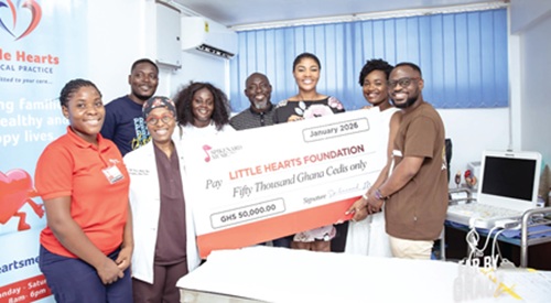 Pastor Edwin Dadson (right) and his team presenting the cheque for GH¢50,000 to Prof. Nana Akyaa Yao (2nd from left), Founder of Little Hearts Foundation 