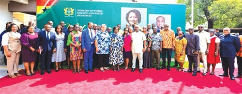 Kenneth Adjei (left), Minister for Works, Housing and Water Resources, Gizella Tetteh-Agbotui (6th from left) Deputy Minister with some directors and staff of the Ministry  during Prof. Naana Jane Opoku-Agyemang (middle), Vice - President’s working visit.