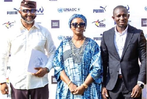 Madam Fatou Diallo Ndiaye (centre) shares a moment with Banasco Nuhu Seidu (right) and National Sports Authority Director-General Yaw Ampofo Ankrah at the launch ceremony.