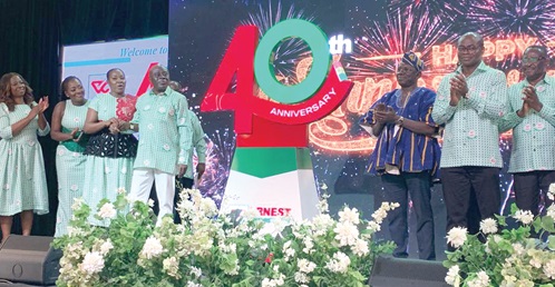 Ernest Bediako Sampong (4th from left), the Founder and Board Chairman of Ernest Chemists Ltd, and his wife, Monica Bediako Sampong (far left); Adjoa Akyema Sampong  (3rd from left), the Chief Executive Officer of Ernest Chemists Ltd; Dr Hafez Adam Taher (3rd from right), the Director of External Health Cooperation at the Technical Coordinating Department of the MoH, unveiling Ernest Chemists Ltd’s 40th anniversary logo