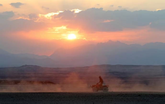 A tourist rides a beach buggy in Wadi Billi, at El-Gouna near the Red Sea, Egypt November 14, 2018. REUTERS/Mohamed Abd El Ghany
