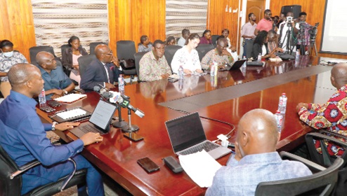 Dr Alhassan Iddrisu (left), Government Statistician, making his presentation. Picture: ELVIS NII NOI DOWUONA 