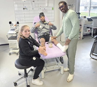 •Dr Prince Pambo (right) visits Francis Abu as he undergoes physiotherapy as part of his recuperation
