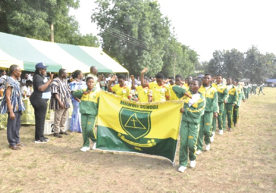 • Dr Esther Yeboah-Adzimah (in cap), Ho Municipal Director of Education, joins other dignitaries in acknowledging Mawuli School during the opening ceremony of the sports festival