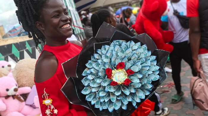 Kenyans drop flowers for Valentine's bouquets of cash. Not everyone is impressed