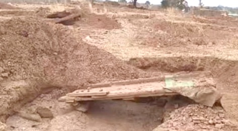 A section of the road that had been destroyed by the miners