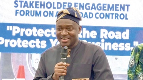 Alhassan Suhuyini (left), Deputy Minister of Roads and Highways, addressing particpants in the stakeholder engagement on axle load control