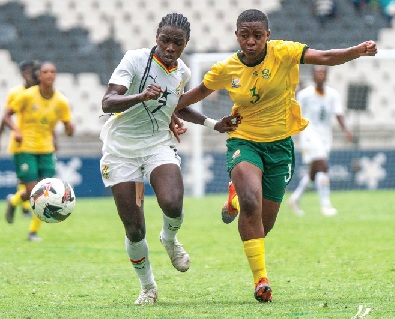 Black Princesses forward Mary Amponsah (left) fends off a challenge from her South African marker in last Saturday’s clash