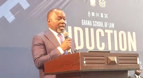 Dr Dominic Ayine (inset), Attorney-General and Minister of Justice, speaking at the induction ceremony