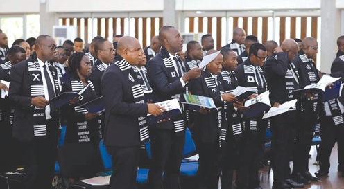 A section of the students taking their oaths of induction
