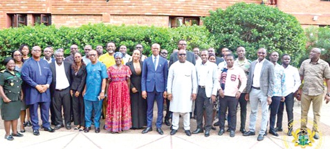 Alhaji Yusif Sulemana (arrowed), Deputy Minister of Lands and Natural Resources, with participants after the Stakeholder Consultative Meeting