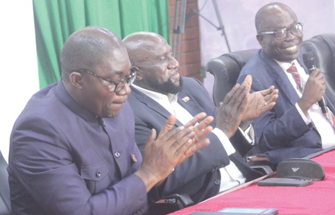 Prof. Ernest K. Davis (right), Director-General, Ghana Education Service, speaking at the event. With him are John B. Yamoah (2nd from right), Chairman, 150th Anniversary Planning Committee, and Very Rev. Ebenezer Kobina Aidoo (left), Headmaster, Mfantsipim SHS. Picture: ESTHER ADJORKOR ADJEI 