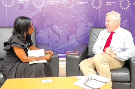 Rune Skinnebach, Ambassador of the European Union to Ghana, explaining a point to Augustina Tawiah, our Senior Staff writer. Picture: ELVIS NII NOI DOWUONA 