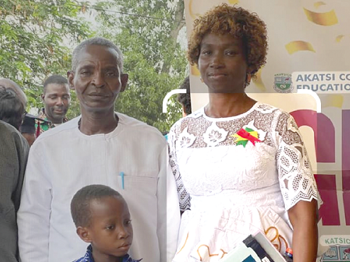 One of the retirees, Daniel Bubasah, and his family