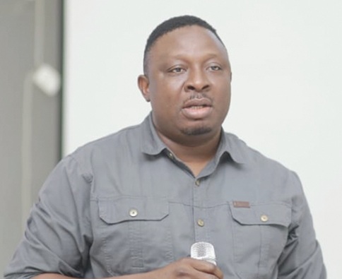 William Domapielle, Project Manager of Plan International Ghana's Integrated Package for Sustainable Community Development, speaking at the training workshop